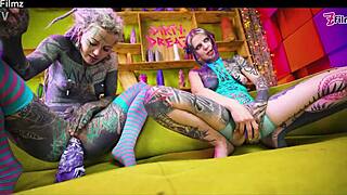 Tattooed Lesbians Engage in Anal Play with Large Toys, Causing Asshole Gaping and Genuine Orgasms