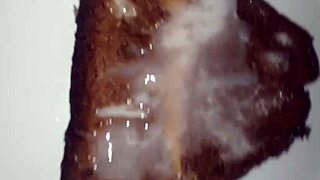 This delicious cake is covered in cum from an intense blowbang bukkake.