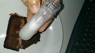 This delicious cake is covered in cum from an intense blowbang bukkake.