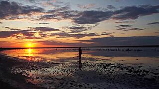 Walk on red sunset of elton salt lake