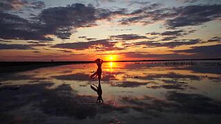 Walk on red sunset of elton salt lake
