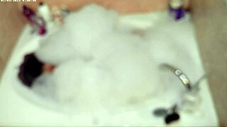 Isn't this solo bubble bathing boy naked in the bath?