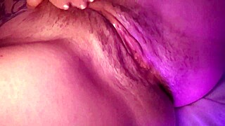 a young girl passionately plays with her stuffed toy