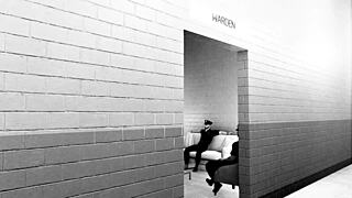 A petite redhead prostitute endures rough double penetration in prison.