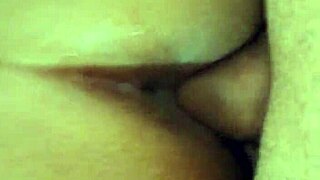 peruvian friend's curvy body lounges on sofa in homemade setting