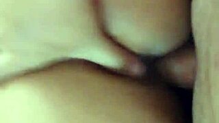 peruvian friend's curvy body lounges on sofa in homemade setting