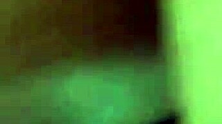 peruvian friend's curvy body lounges on sofa in homemade setting