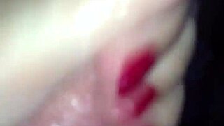 A hand with red nails receives cum in this narrative.