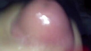 A hand with red nails receives cum in this narrative.