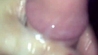 A hand with red nails receives cum in this narrative.