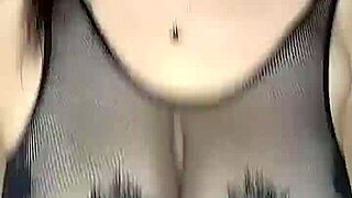 in stockings fucks huge natural tits from above?
