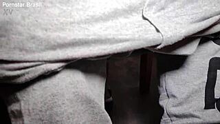 Brazilian pornstar strokes huge tattooed cock with feet fetish handjob, cumming in solo masturbation