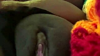 Ebony amateur squirts easily in solo homemade scene then uses dildo!