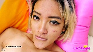 Gorgeous asian model displays her body in photoshoot