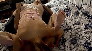 Is This White Slut Sucking and Rimming in Satin Lingerie?