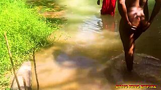 i'm fucking this african whore in the stream with my big dick