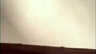 Hey, check out this celebrity belly dancer with huge belly shaking to music in glasses.