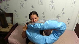 milf looner blows up beach circle balloons in fetish fun