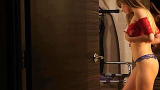 Is Angel Young getting naughty with the towel boy in her hotel room?