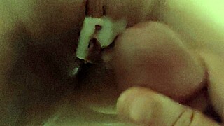 Close on her wet pussy with lots of cum after fucking