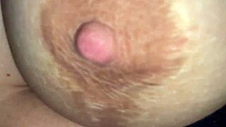 A guy cums on his stepmother's milky tits