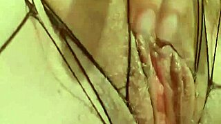 Mature woman experiencing wetness.