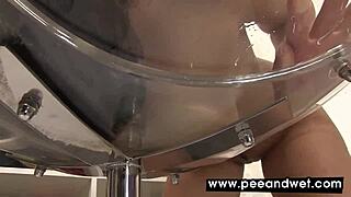 cute chick pees in a big glass balloon