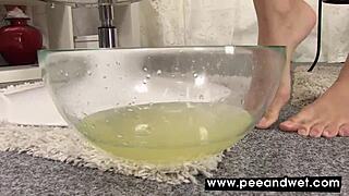 cute chick pees in a big glass balloon