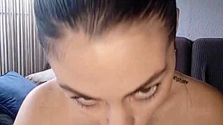 Brunette with huge tits sucks dildo and masturbates, fingering her pussy to orgasm