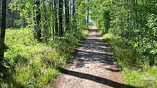 The young amateur teen couple is exploring the outdoors in the woods
