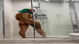 Naked roxy showers and masturbates with moaning and toys in bathroom