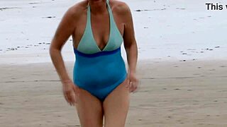 on the beach, the stepmother gets fucked by her friend's big cock and cums inside