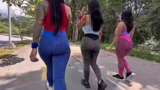 Three girls passionately ride a dick in anal sex outdoors.