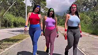 Three girls passionately ride a dick in anal sex outdoors.