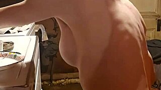 Playing with her tits and giving hand job