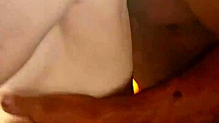 Playing with her tits and giving hand job