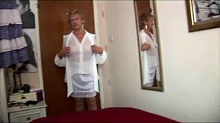 Look at this naughty granny flashing her pussy through the slip!