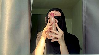 The muslim teacher is in the classroom.