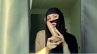 The muslim teacher is in the classroom.