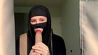 The muslim teacher is in the classroom.