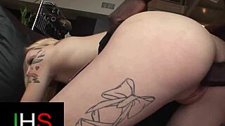 Is that big African cock penetrating her ass?