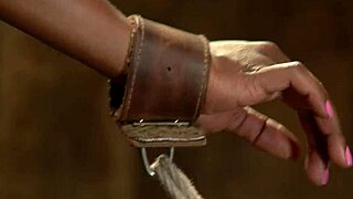 Bound and anal hooked ebony is spanked