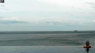 I relax by the infinity pool with my cute feet