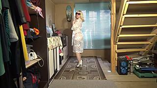 Watch this juicy milf striptease in lingerie, stockings, heels and ripped clothes