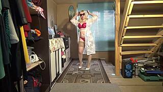 Watch this juicy milf striptease in lingerie, stockings, heels and ripped clothes