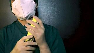 She slips on latex gloves to tease his fetish desires slowly