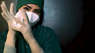 She slips on latex gloves to tease his fetish desires slowly