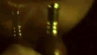 flames flicker as exotic dancer strips bare teasing her sensual curves