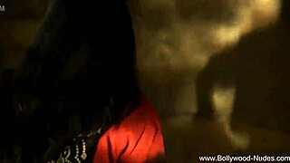 dreamy indian beauty sways in erotic striptease seduction