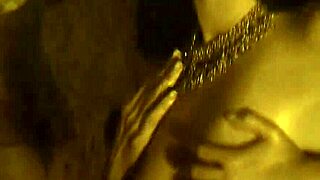 flames flicker as exotic dancer strips bare teasing her sensual curves